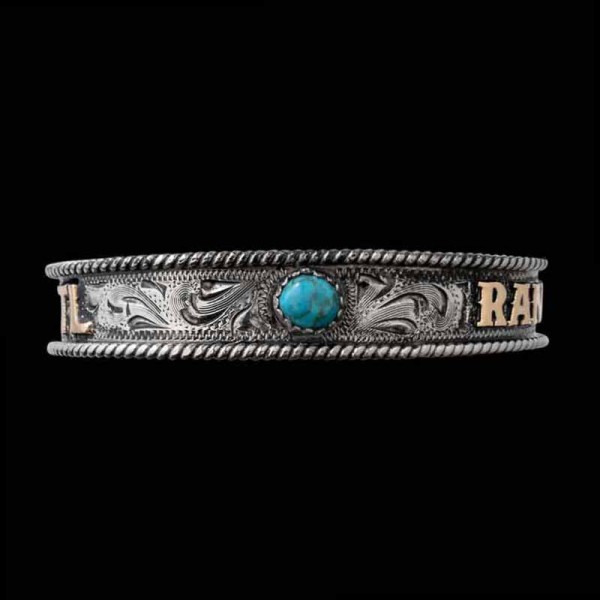 Our Charlie Western Cuff Bracelet features a classy hand engraved base on antique finish german silver base with gorgeous turquoise stones and customizable bronze lettering. Order it now!